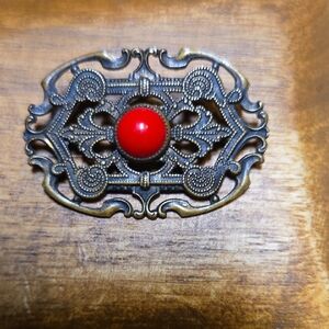 Vintage Ornate Brooch with Red Center